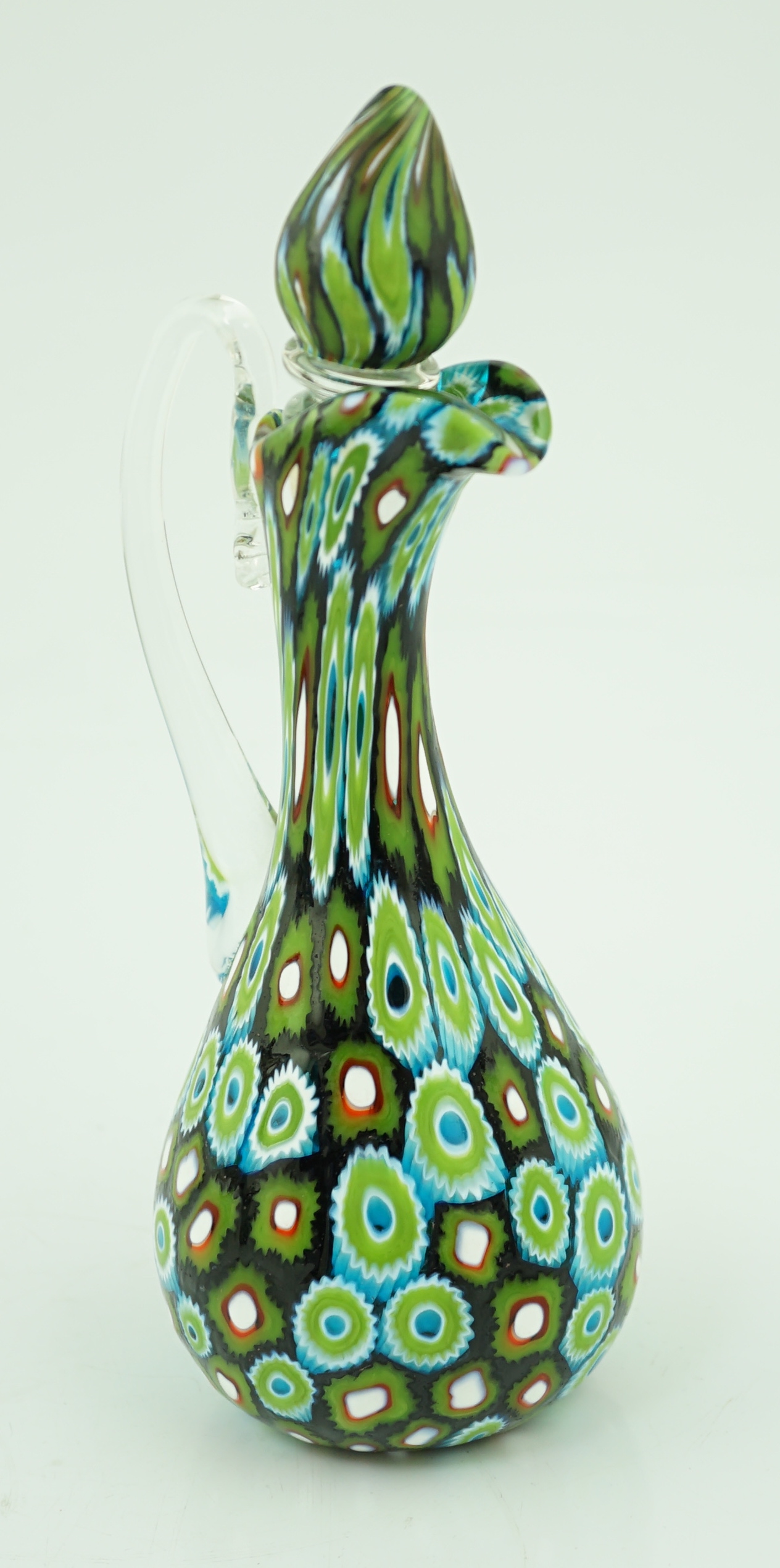 A Murano glass Murrine carafe and stopper, unsigned, 23cm, Please note this lot attracts an additional import tax of 20% on the hammer price